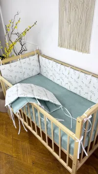 Бортики в кроватку для новорожденных и малышей